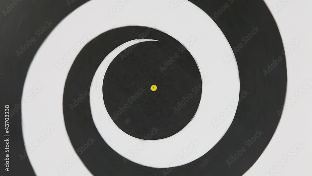 Spinning black and white hypnotizing wheel. Spinning black and white hypnotizing wheel.