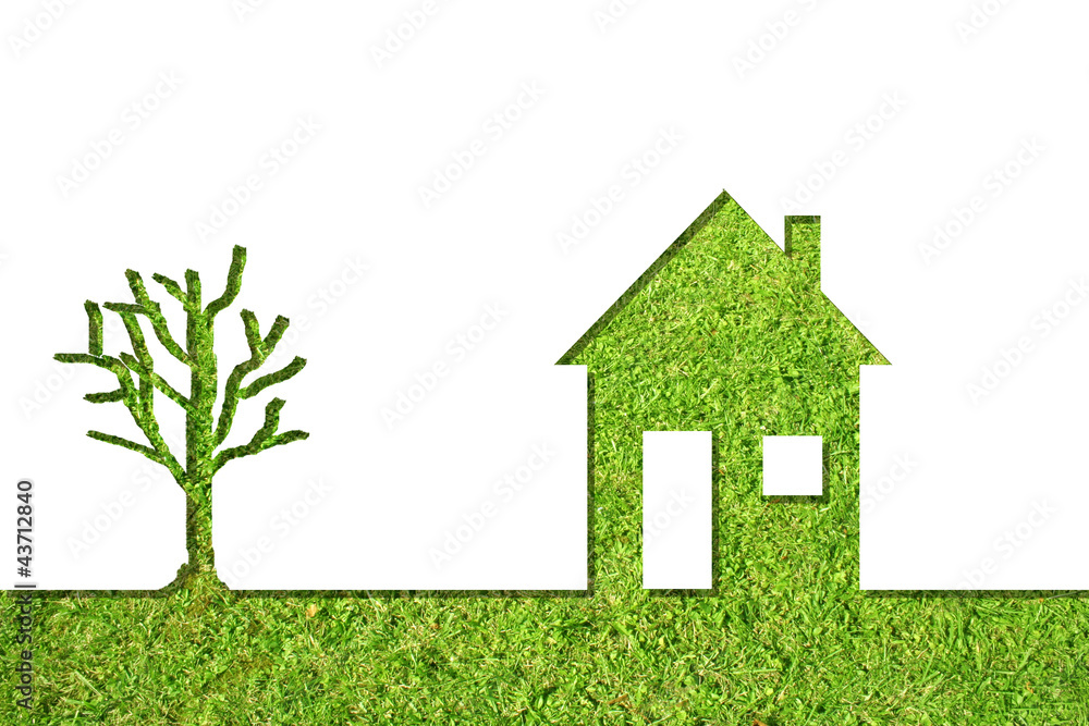 Conceptual house symbol of grass with green tree