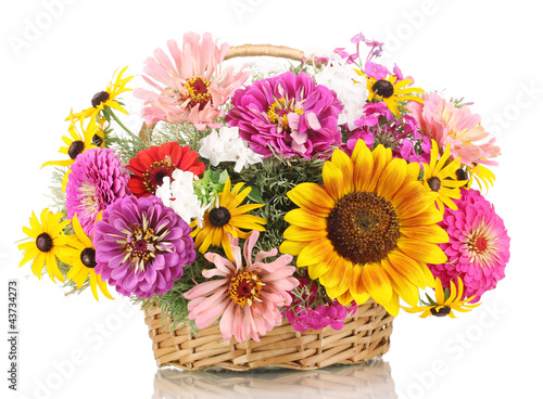 Fototapeta Naklejka Na Ścianę i Meble -  Beautiful bouquet of bright flowers in basket isolated on white