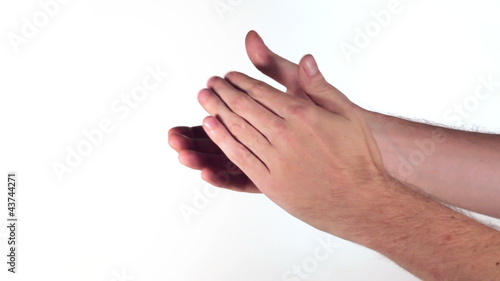 Men's hands applauded on a white background