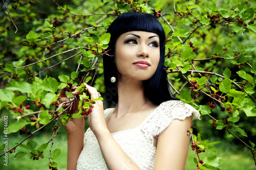 Photography Beautiful woman with mulberry