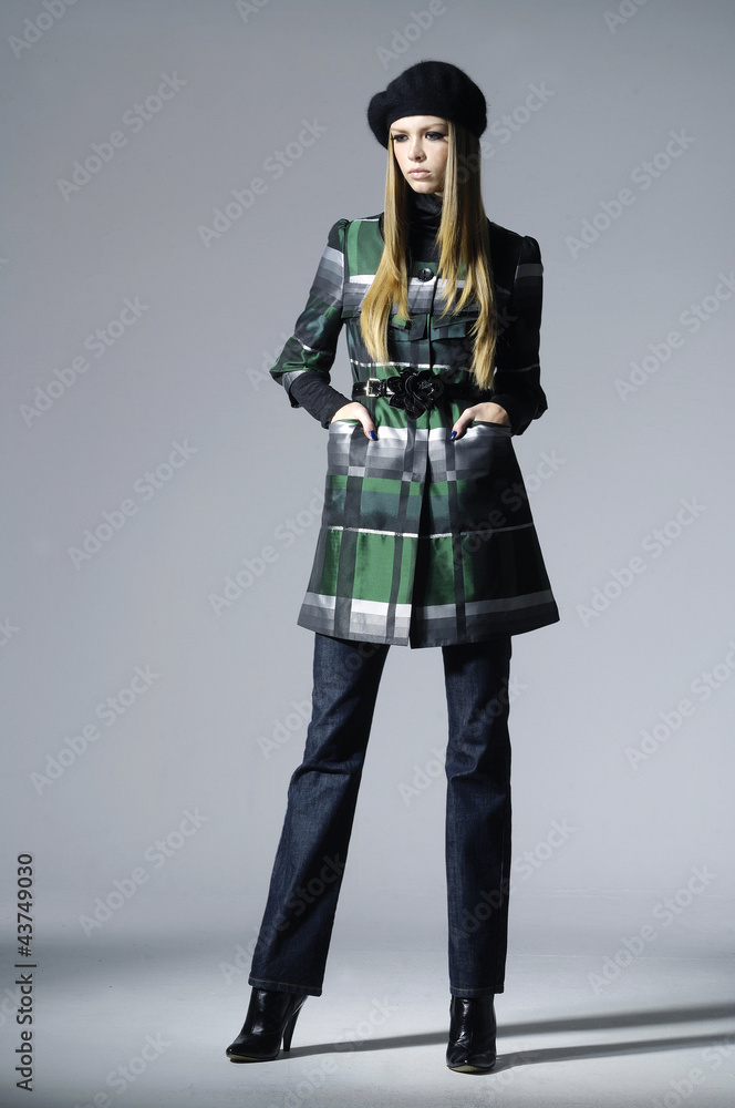 portrait of a styled professional model on light background portrait of a styled professional model on light background