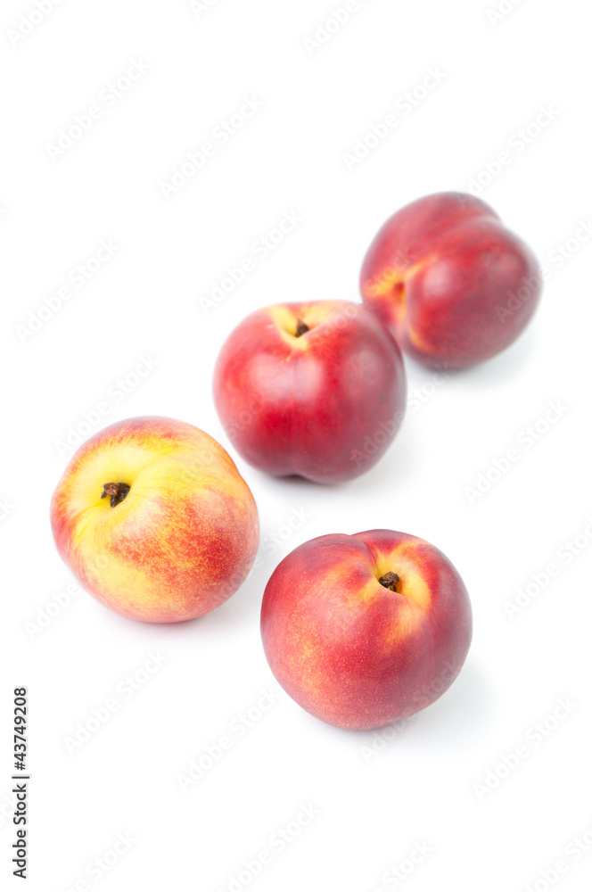 Ripe nectarines isolated over white Ripe nectarines isolated over white