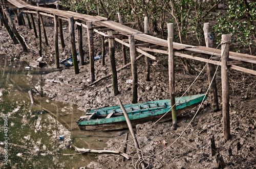 old row boat in the mud photo