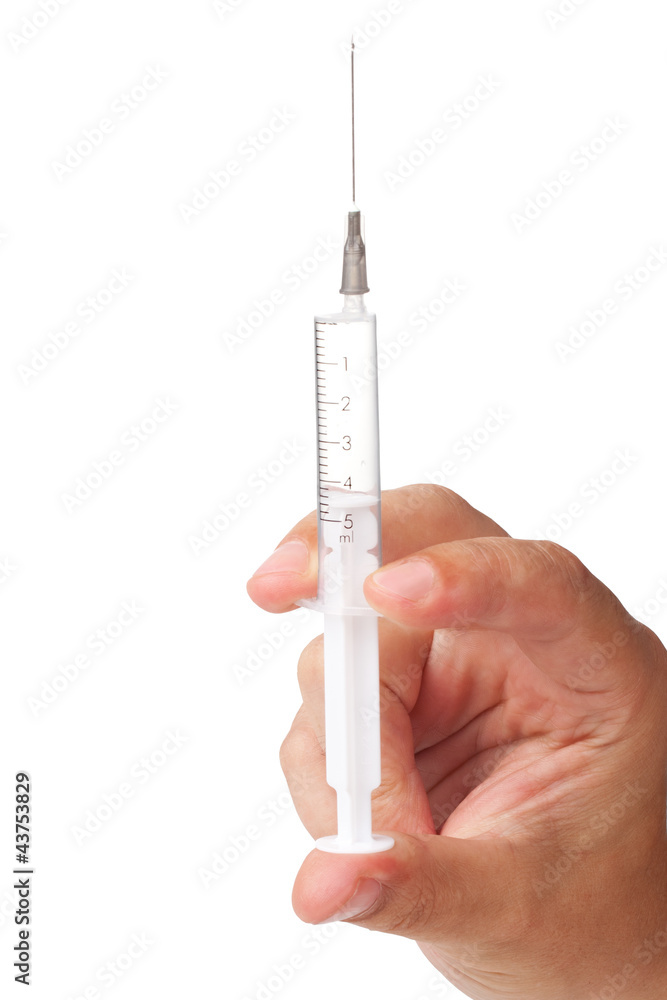 Syringe in hand Syringe in hand
