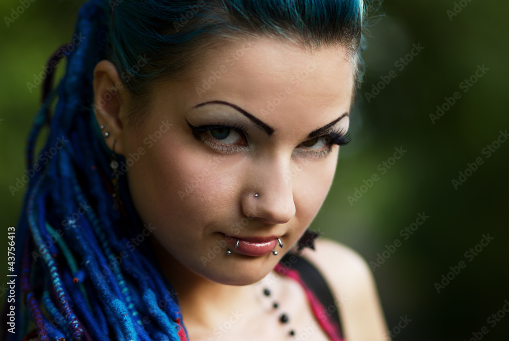 Portrait of diverse and inclusive young female model with facial