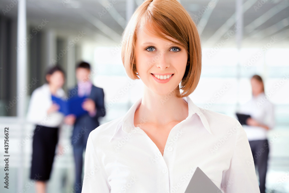 Business team A business team with pretty business woman Business team A business team with pretty business woman