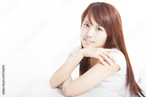 beautiful asian young woman sitting on chair isolated