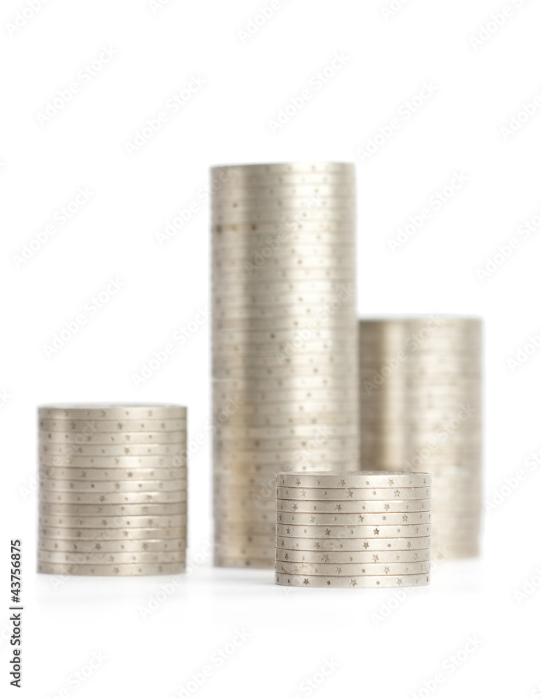 Silver coins are erected vertically in columns Silver coins are erected vertically in columns
