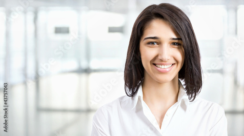 Young business woman in an office
