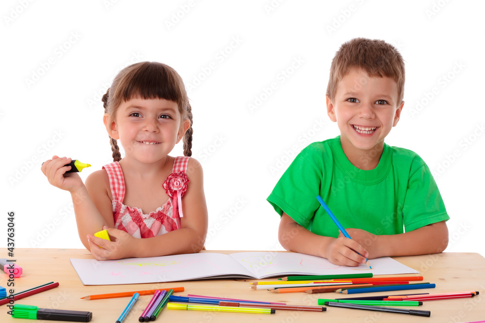 Two little kids draw with crayons Two little kids draw with crayons