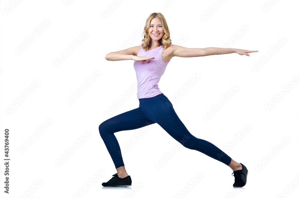 Female sportsman doing exercises on white Female sportsman doing exercises on white