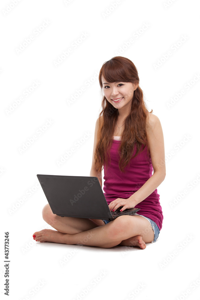 Asian woman lying down with laptop isolated on white background. Asian woman lying down with laptop isolated on white background.