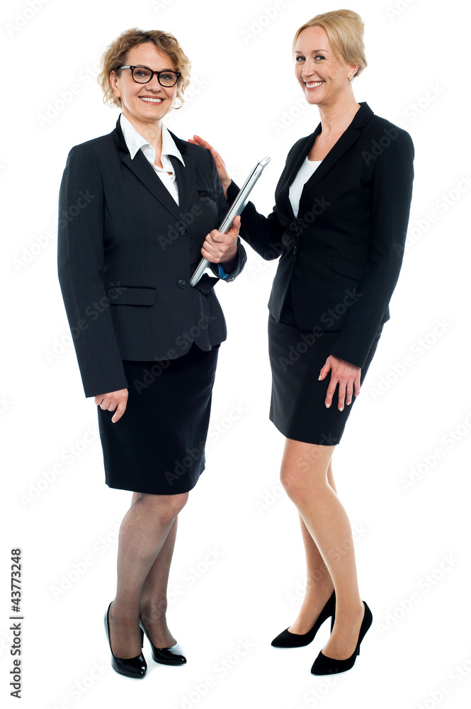 Full length shot of corporate female friends Full length shot of corporate female friends