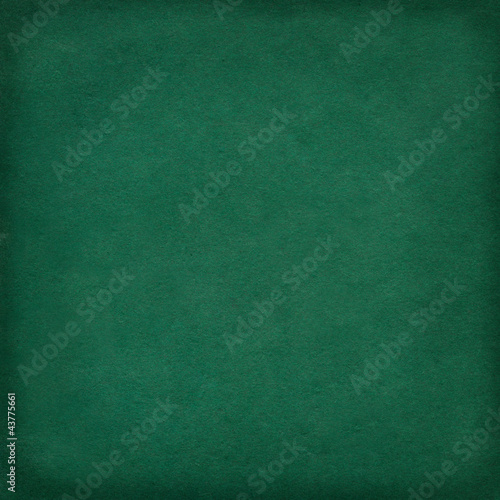 Green paper background with frame