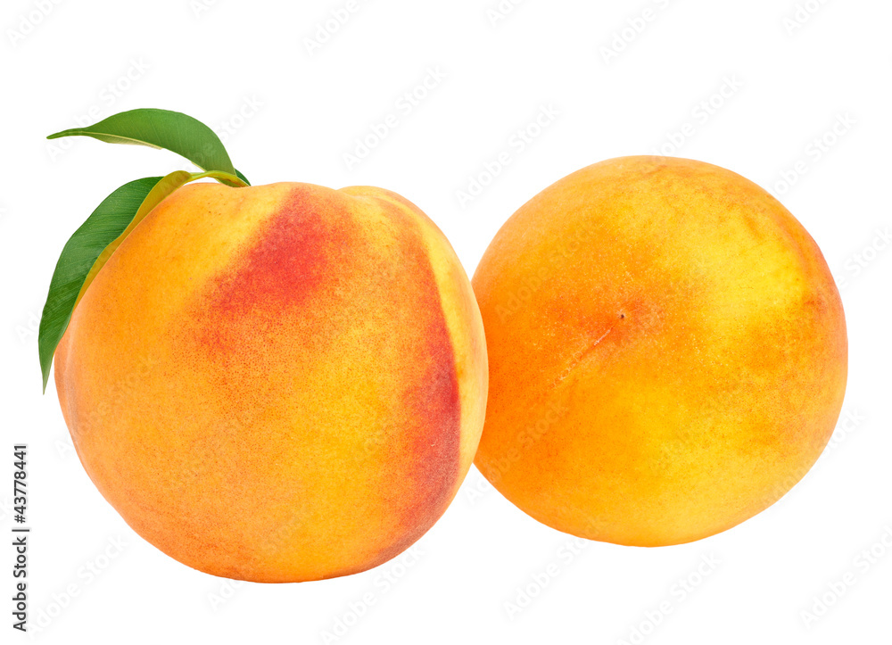 ripe peach fruits with green leaves isolated on white background ripe peach fruits with green leaves isolated on white background