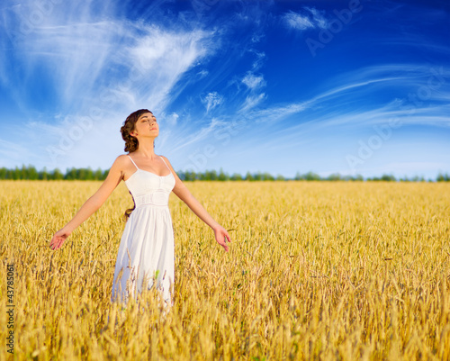 Woman on wheat field