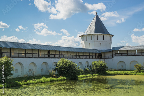 Wall with tower in Spaso-Prilutsky Monastery in Vologda photo