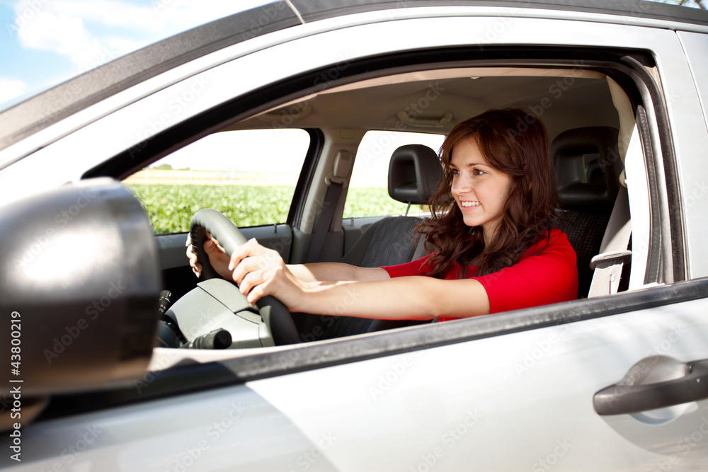 Excited woman driving