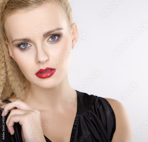 Young pretty woman with beautiful blond hairs