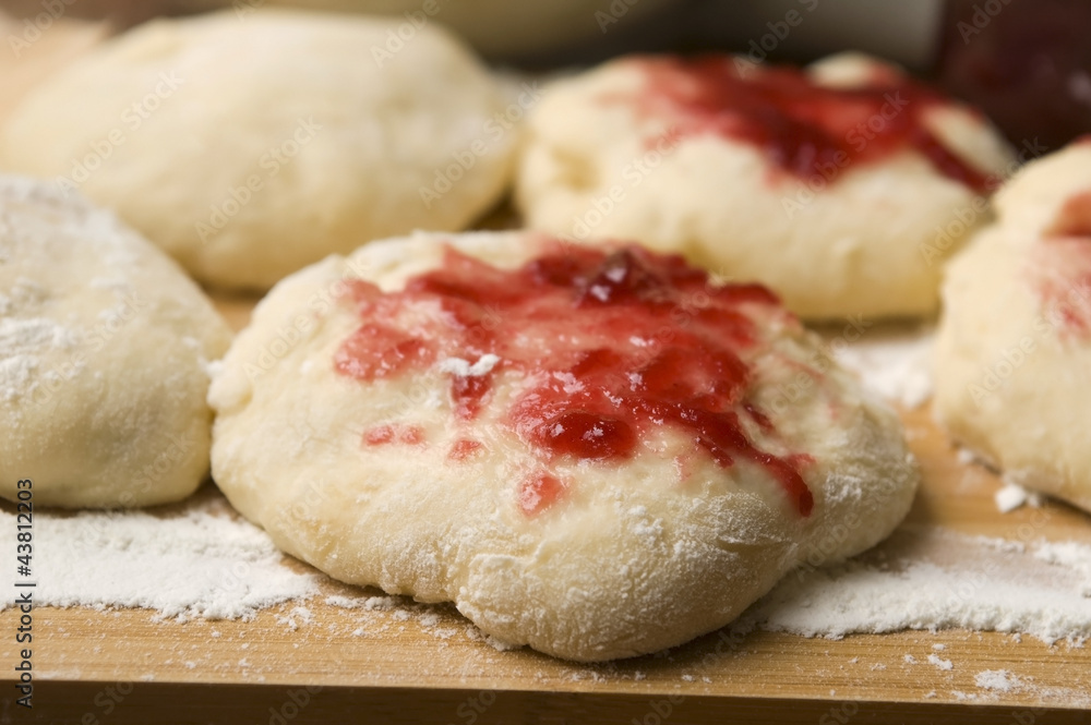 Fototapeta premium Sweet doughnuts with rose marmelade