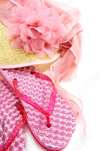 Summer sandals and a straw hat and veil.