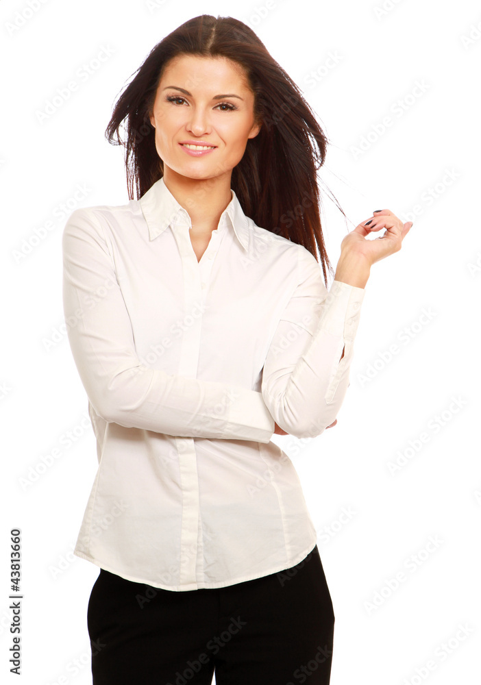 Portrait of a smiling young woman pointing up Portrait of a smiling young woman pointing up