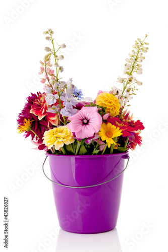 Fototapeta Naklejka Na Ścianę i Meble -  Bucket garden flowers