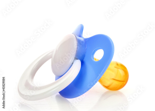blue baby's pacifier isolated on white background photo