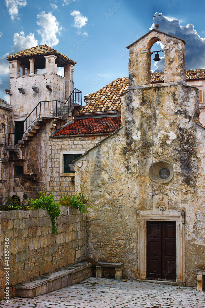 Church and Marco Polo tower in Korcula. Croatia.