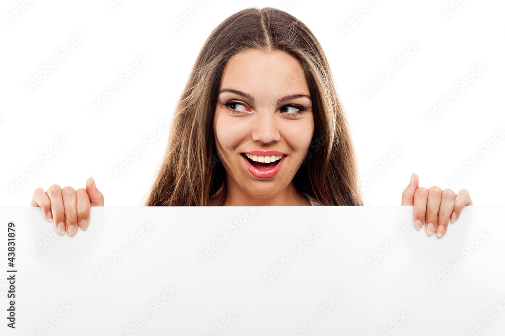 Portrait of a young woman with blank billboard Portrait of a young woman with blank billboard