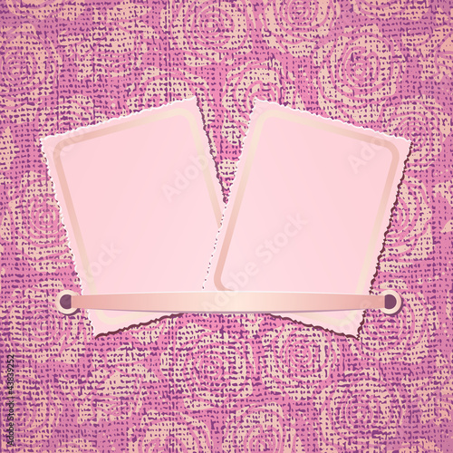 Two photo card on pink fabric background