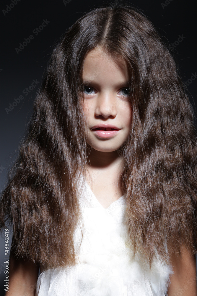 portrait of young beautiful little girl with dark hair portrait of young beautiful little girl with dark hair