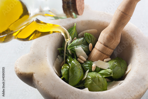 Making pesto with a mortar