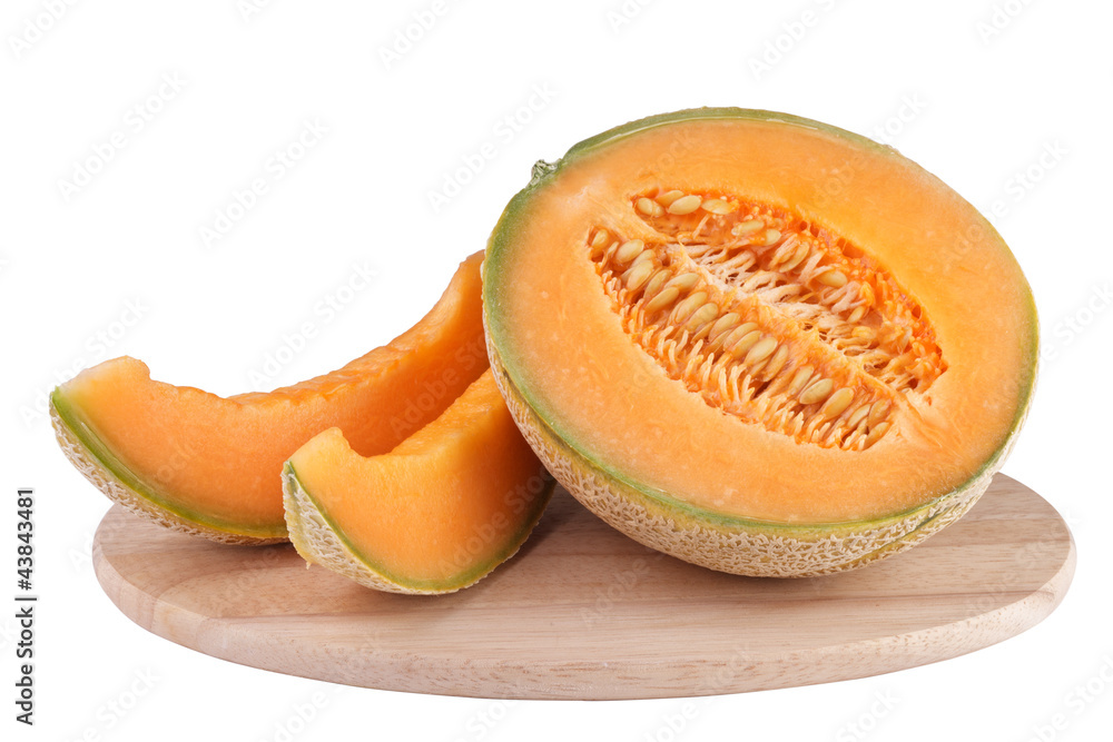 sliced piece cantaloupe melon on wooden carving board sliced piece cantaloupe melon on wooden carving board