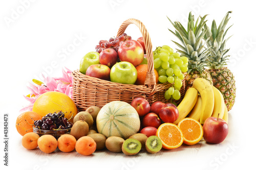 Fototapeta Naklejka Na Ścianę i Meble -  Composition with assorted fruits in wicker basket