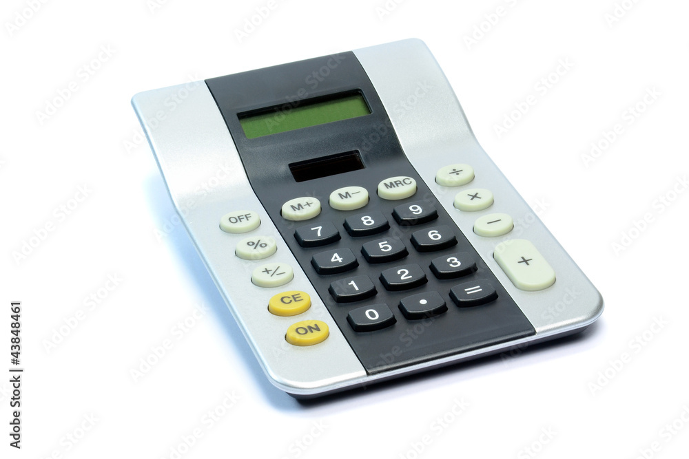 A large solar powered calculator on a white background A large solar powered calculator on a white background