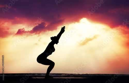 Yoga silhouette on the beach © pikoso.kz