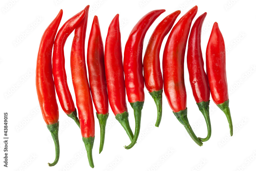 Red chili peppers isolated on the white Red chili peppers isolated on the white