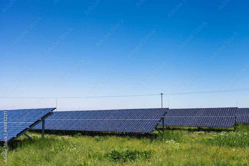 Sunlight as a resource of renewable energy: solar panels on a su Sunlight as a resource of renewable energy: solar panels on a su