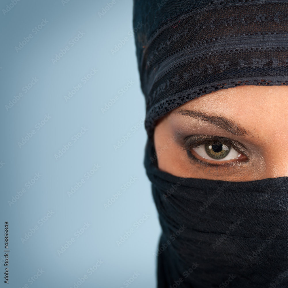 Portrait of veiled woman, focus on eyes. Portrait of veiled woman, focus on eyes.