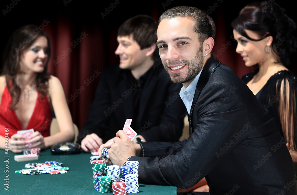 friends drinking and celebrating a gambling night friends drinking and celebrating a gambling night