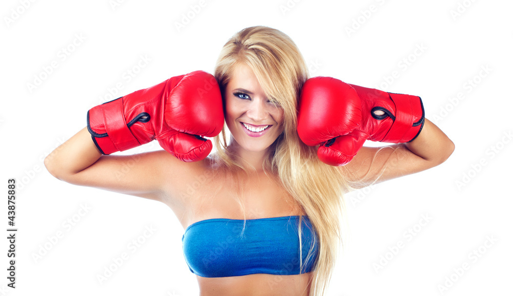 Photo of young wonderful woman wearing boxing glove Photo of young wonderful woman wearing boxing glove