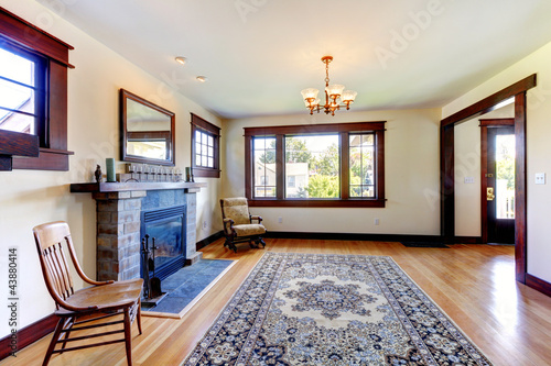 Empty room with fireplace in an old nice house.