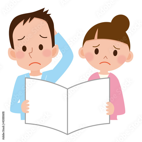 書類を見る男女