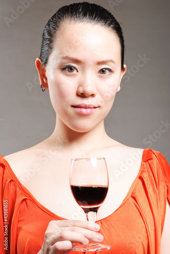 The girl in the open red wine