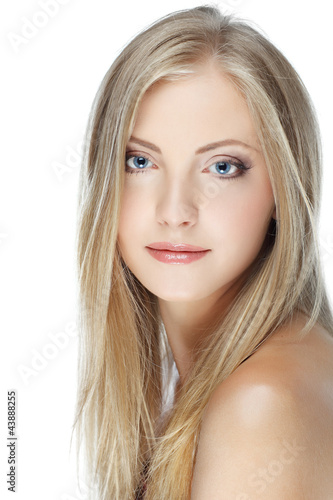 Closeup portrait of young woman with beautiful blue eyes on whit