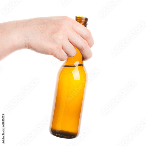 Beer bottle in the hand