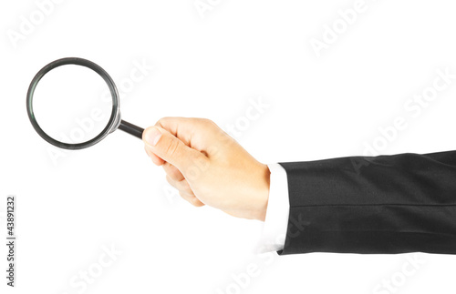 Magnifying glass in hand