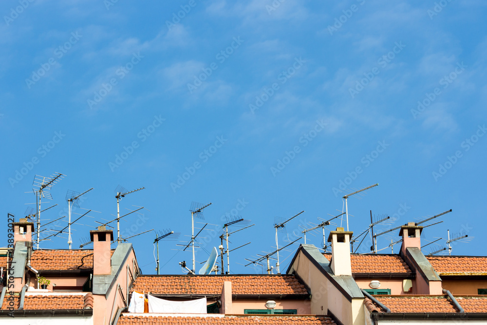 many antennas installed on the roof of a building many antennas installed on the roof of a building